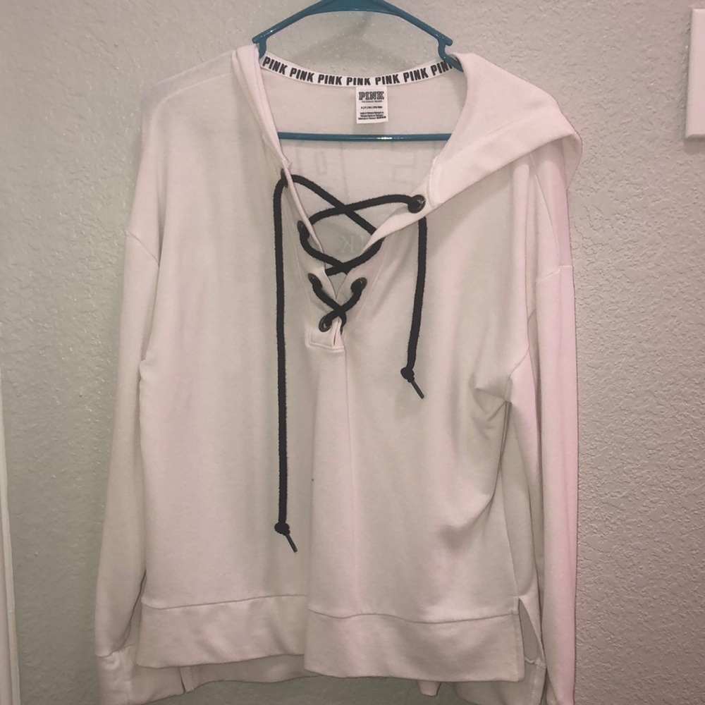 A cute white “pink” top with open front.